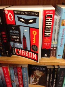 Three beloved books on one shelf at BookPeople -- North of Beautiful, The Perks of Being a Wallflower, and The Amazing Adventures of Kavalier & Clay.